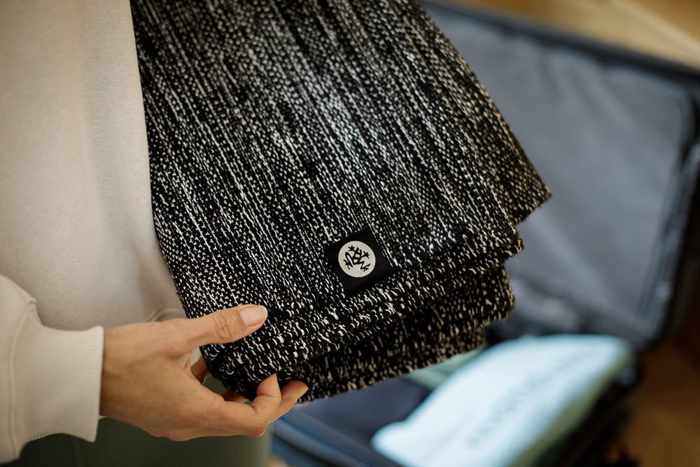 Handwoven Manduka Shala yoga rug and its cotton texture