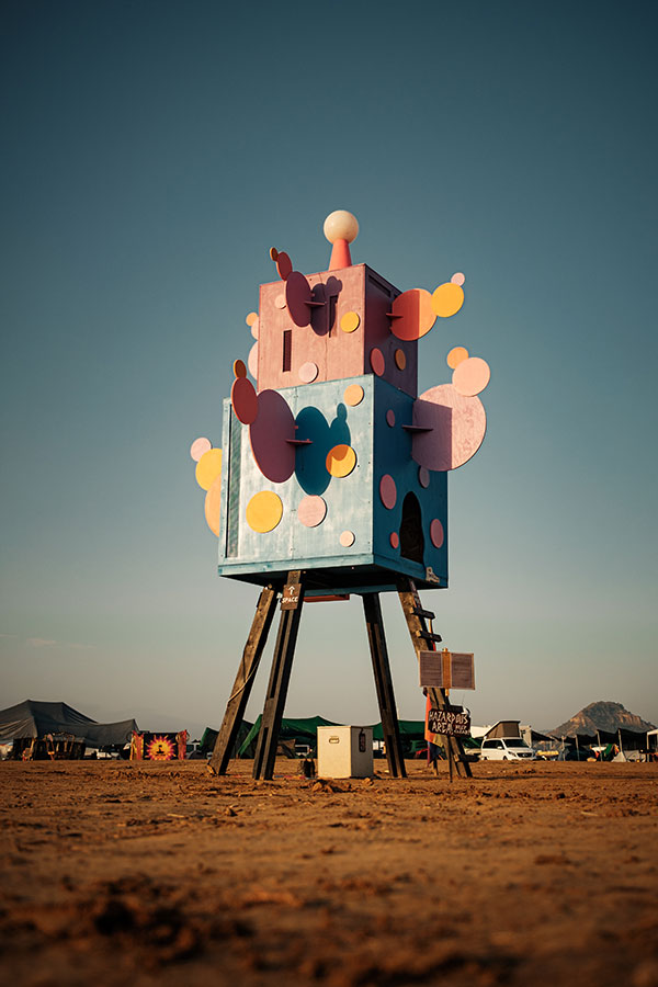 Tall installation on legs with colourful abstract shapes at Nowhere