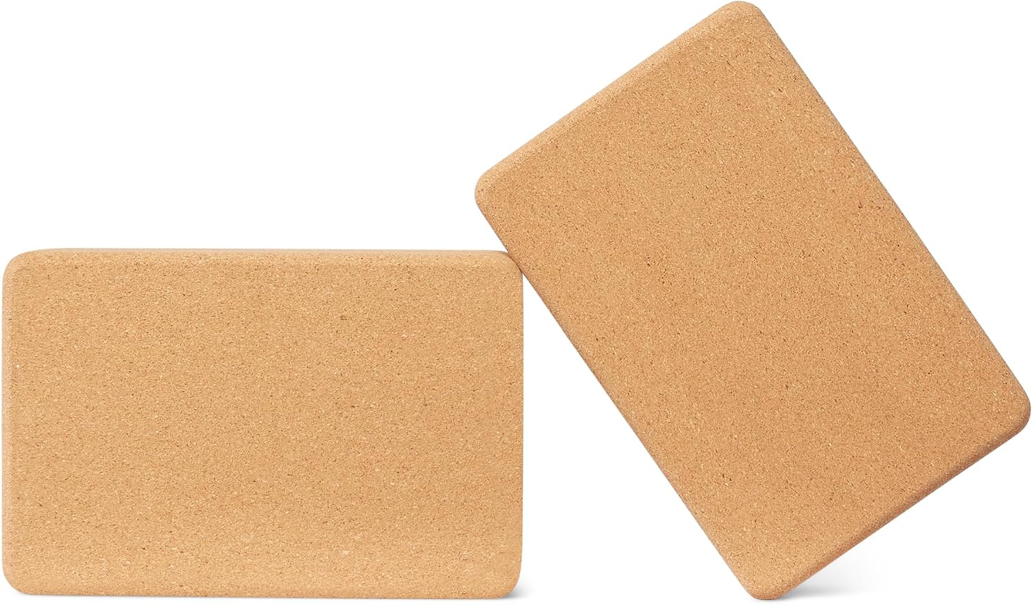 A matching pair of Amazon Basics natural cork yoga blocks