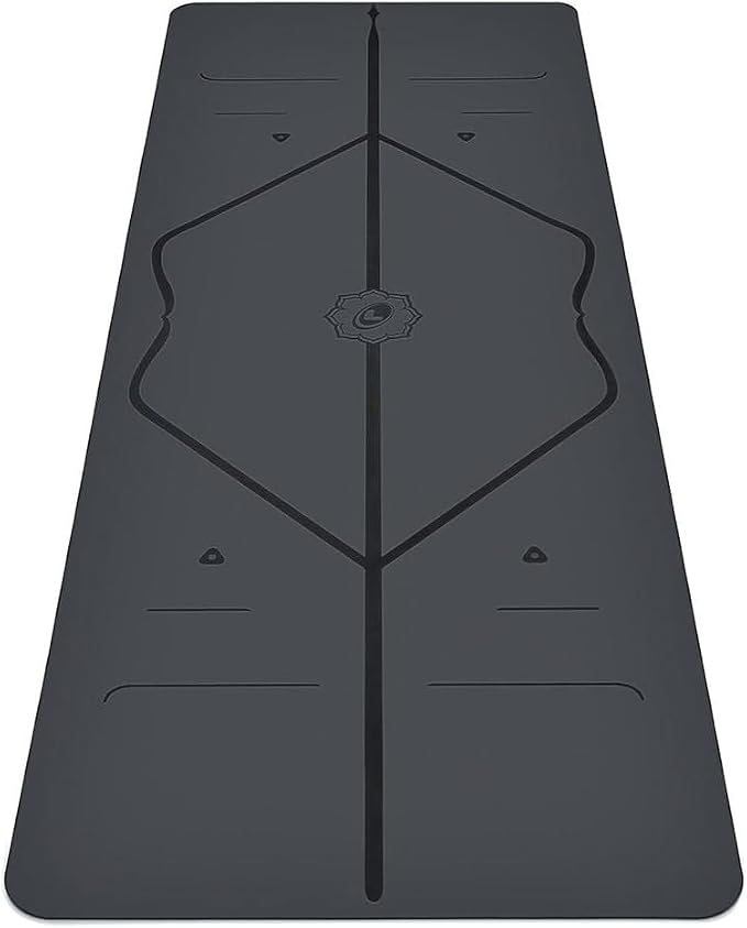 Grey Liforme Travel yoga mat with its alignment markings visible