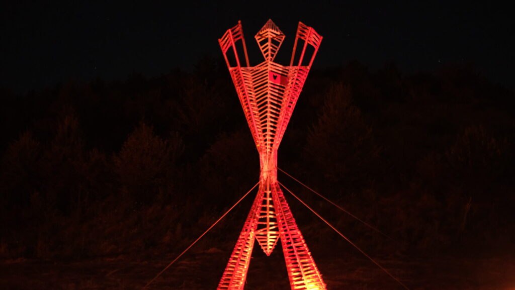 Illuminated wooden artwork at RoBurn, Romania, in 2023.